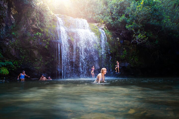 Swim under a waterfall!